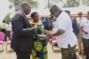 H.E. Jessica Alupo (C) shares a light moment with Hon. Jacob Oboth (L) and Lt Gen Sam Okiding (R)