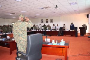 CDF Gen Muhoozi Kainerugaba saluting Hon Min Oboth Oboth during the strategic planning retreat FY 2025-26 at MoDVA HQs